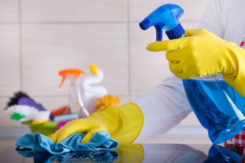Carpet cleaning team preparing equipment safely